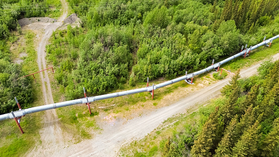 The Trans Alaska Pipeline makes it way across the many miles of Alaska.  The pipeline carries oil from Northern Prudoe Bay to the Port of Valdez in the South.