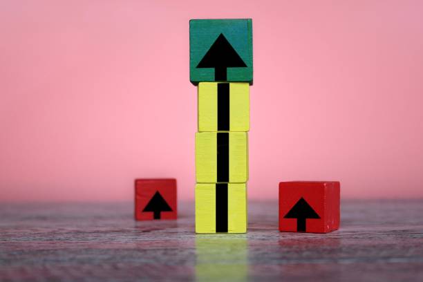 istock Wooden cubes and arrow icon with different color. 1502123204