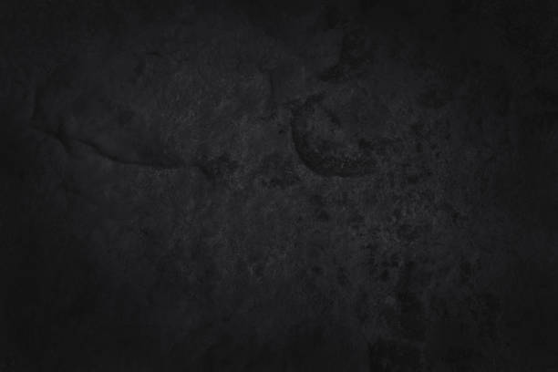 istock Dark grey black slate texture in natural pattern with high resolution for background and design art work. Black stone wall. 1502126624