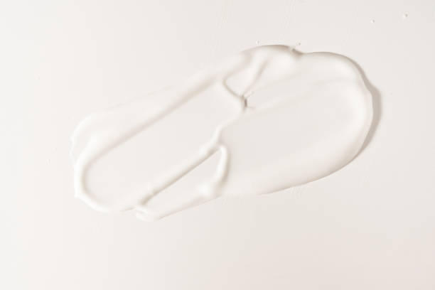 istock A white cosmetic smear on an isolated white background. Sample for advertising and packaging. The texture of a white face cream. Cosmetic skin care product with copy space. High quality photo 1502127569