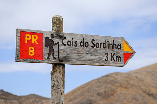 Visit the Atlantic island of Madeira. Hiking at Ponta de São Lourenço. Signpost with the hike number PR 8 towards Cais do Sardinha in the east of the island.