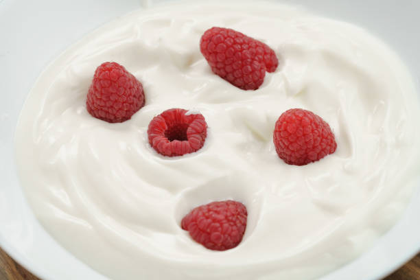 istock organic yogurt with fresh raspberries closeup 1502134757