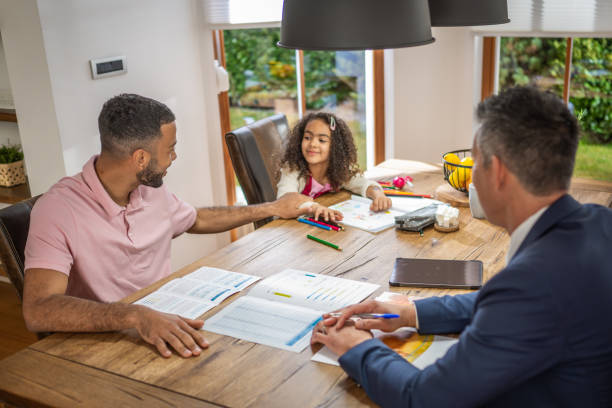 istock Real estate agent explaining mortgage agreement to client 1502135552
