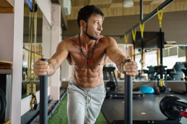 Distracted Athlete pushing weights in the gym