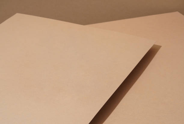 istock The colorful background from brown paper with shadow. Abstract geometric 1502138878