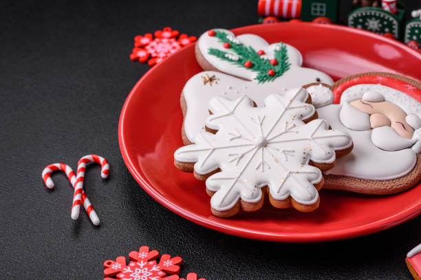 istock Beautiful bright colorful homemade gingerbread cookies on a ceramic plate 1502139108