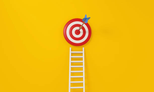 istock staircase with target icon. Achieving goals and objectives or goal setting 1502140279