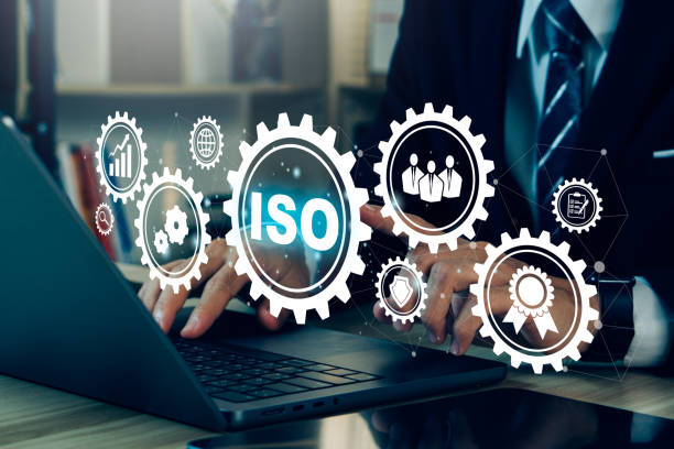 istock ISO standards quality control concept.Business man using laptop with ISO icon.Assurance warranty,business technology. 1502149464
