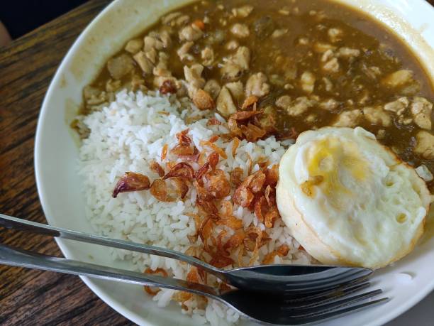 istock Chicken Curry Rice With delicious sunny side Up 1502160610