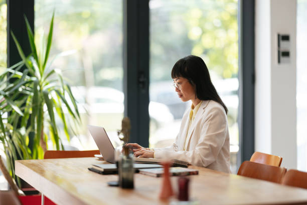 istock Businesswoman Using A Laptop Computer In The Office 1502170066