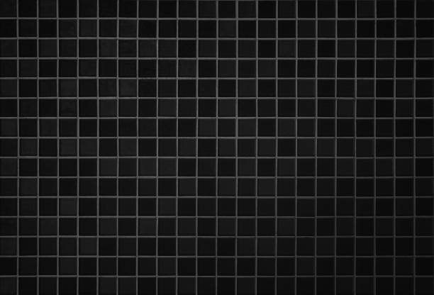 istock Dark black ceramic wall and floor tiles mosaic background in bathroom and kitchen. Design pattern geometric with grid wallpaper texture decoration pool. Simple seamless abstract surface grunge. 1502171159
