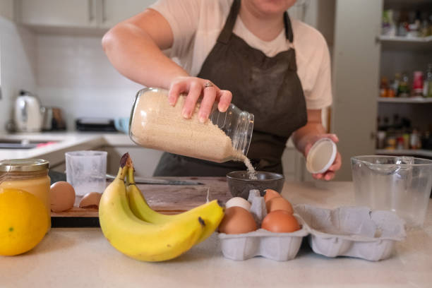 istock A Girl Pouring Sugar into a Bowl 1502171222