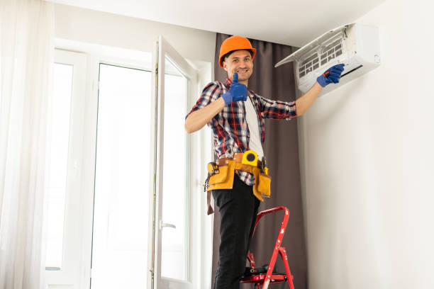 istock Professional technician maintaining modern air conditioner indoors 1502188623