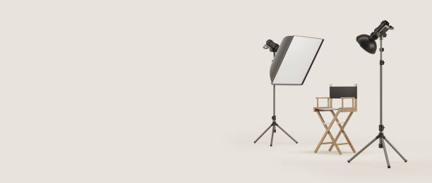 istock Director's chair and photo studio equipment on copy space background 1502190436