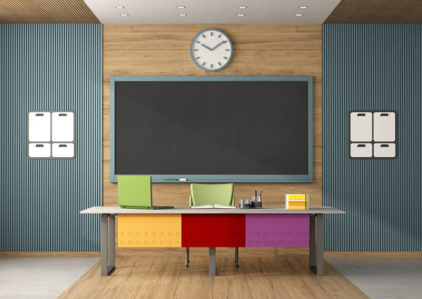 istock Colorful classroom without students with blackboard and teacher's desk 1502204603