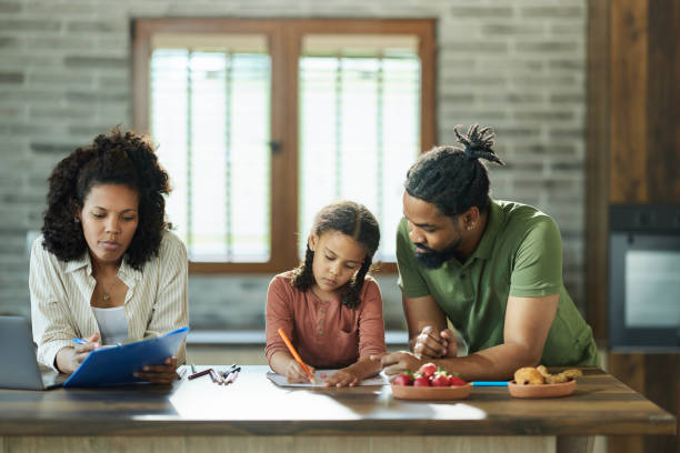 istock Young black family spending their time at home. 1502217011