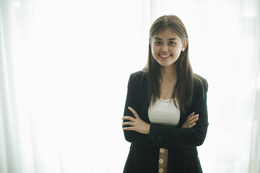 Portrait of Asian Chinese female entrepreneur in casuals