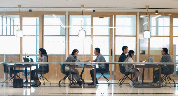 istock Multiracial group of Asian people work in co-sharing office open plan 1502220261