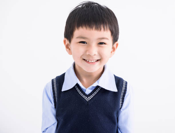 istock closeup Happy asian boy face  on white background 1502227805