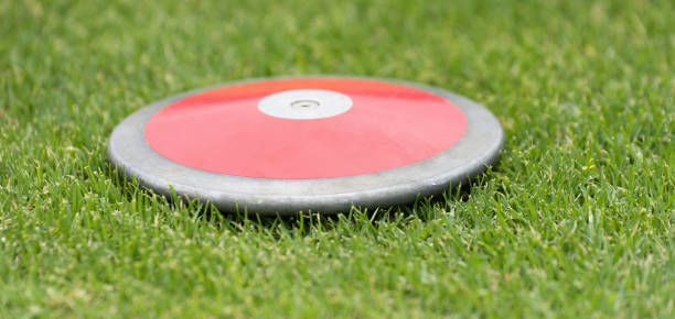 istock Close up of discuses on grass 1502227840