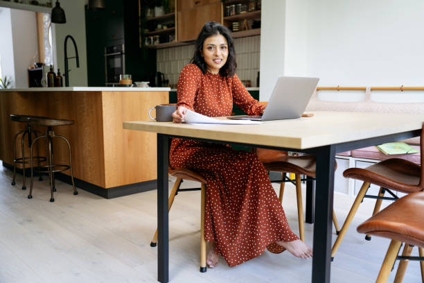 istock Relaxed Indian businesswoman working at home 1502237006