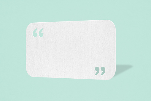 For communication and social media, customer feedback concept, white speech bubble with quote sign grunge paper cut on grunge light green background