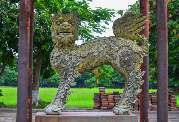 many stone soldiers mandarin statues in royal Khai Dinh tomb in Hue Vietnam