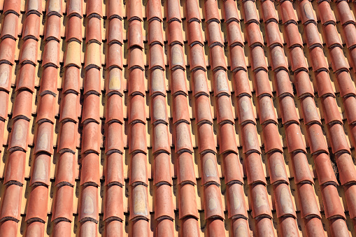 Orange colored tile house roof on the island of Rab in Croatia