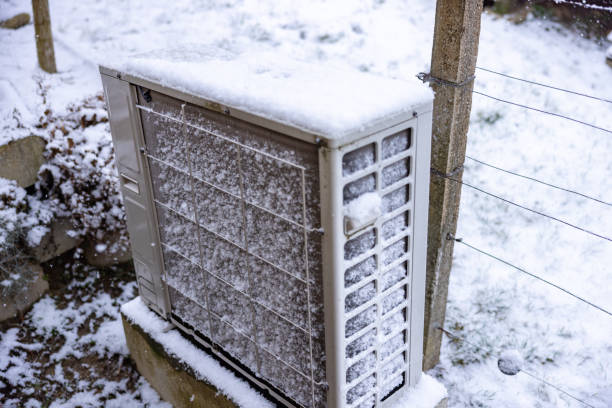 istock Heat pump outdoors on snowy landscape 1502262073