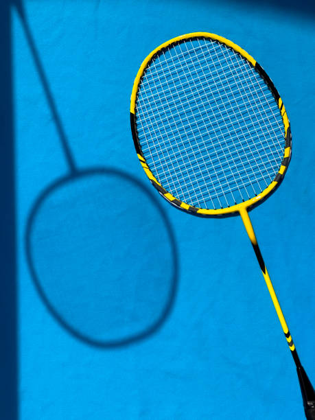 istock Rackets for badminton on a bright sunny day. View from above, drawing shadows 1502268736