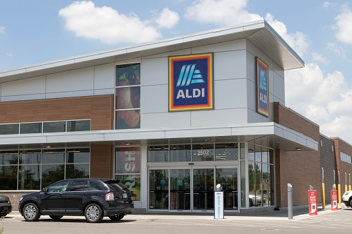 Indianapolis - June 24, 2023: Aldi Discount Supermarket. Aldi sells a range of grocery items, including produce, meat and dairy at discount prices.