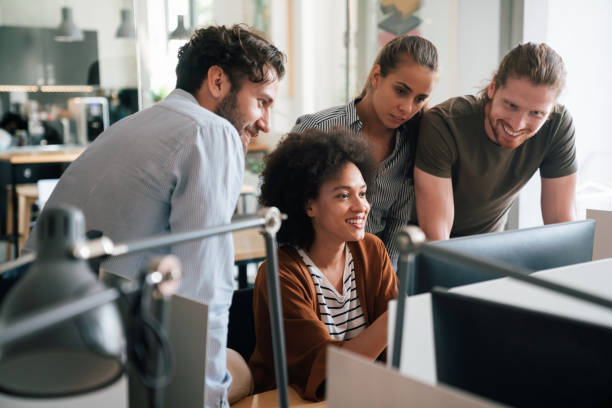 istock Team of young creative marketing experts brainstorming during work 1502283771