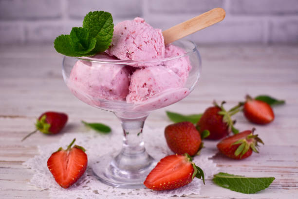 istock Strawberry ice cream and fresh strawberries on a white background. 1502306576