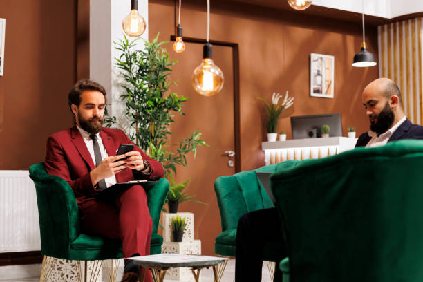 istock Business partners in hotel lobby 1502312778