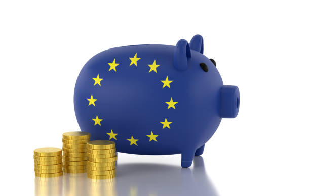 piggy bank textured with european union flag and coins isolated on white background - european union coin european union currency coin isolated objects imagens e fotografias de stock
