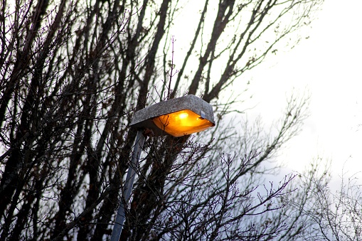 Street light lamp on blue sky background