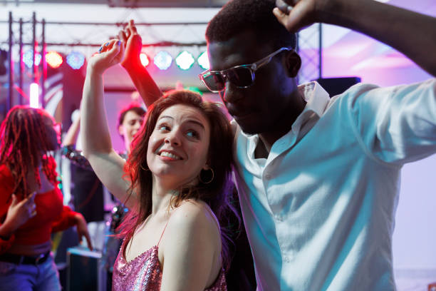 istock Romantic couple dancing in nightclub 1502313579