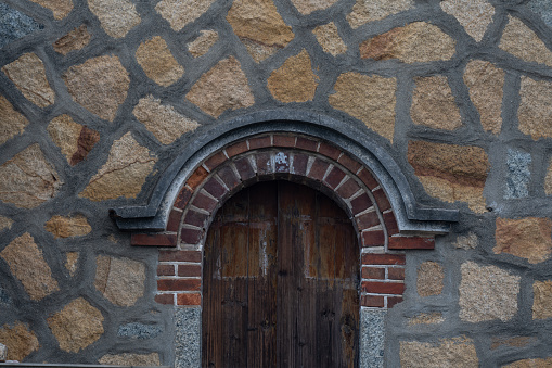 The doors of stone buildings by the seaside