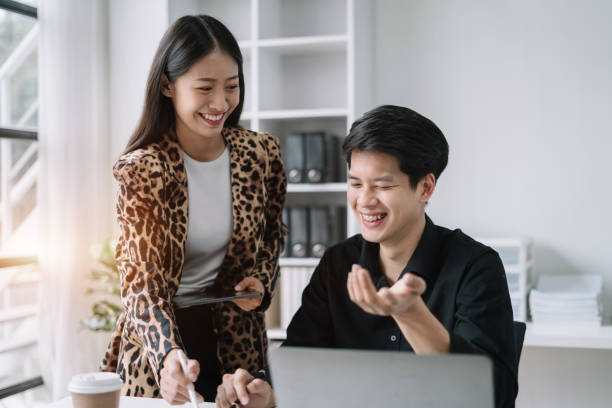 istock Businessmen team or financial data analysts working with tablets and laptop computers and data graphs together. Plan to analyzing projects in the office. 1502315106