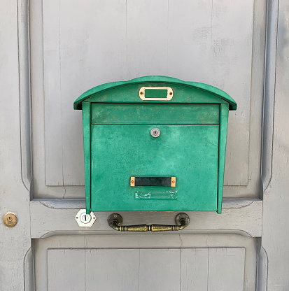 European style green mailbox stuck
