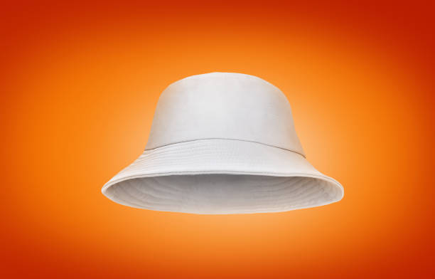 istock white bucket hat isolated on orange background 1502350900