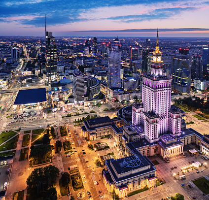 Aerial view on Palace of Science and Culture in Warsaw. View from above to the modern city center with illumination