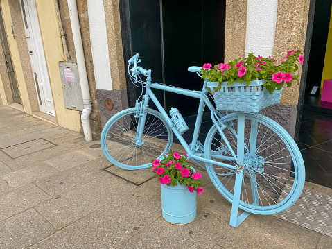 Light blue bicycle with flowers