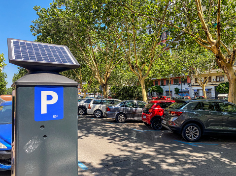 Valencia, Spain - June 25, 2023: Space reserved for parking cars in the city. The government is creating them in order to accommodate the number of increasing cars moving around