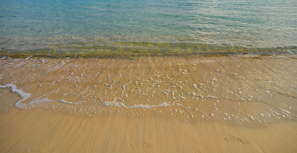 Beach with Tide Rolling In, Cabo San Lucas Mexico on a Sunny Afternoon