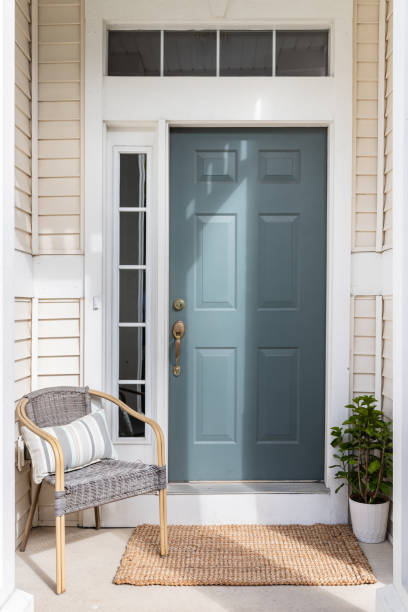 istock A blue front door detail with a small porch. 1502387407