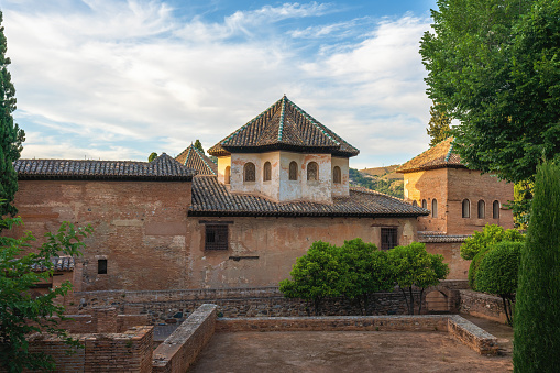 Granada, Spain - May 24, 2019: Tower of Hall of the Abencerrajes at Nasrid Palaces of Alhambra - Granada, Andalusia, Spain