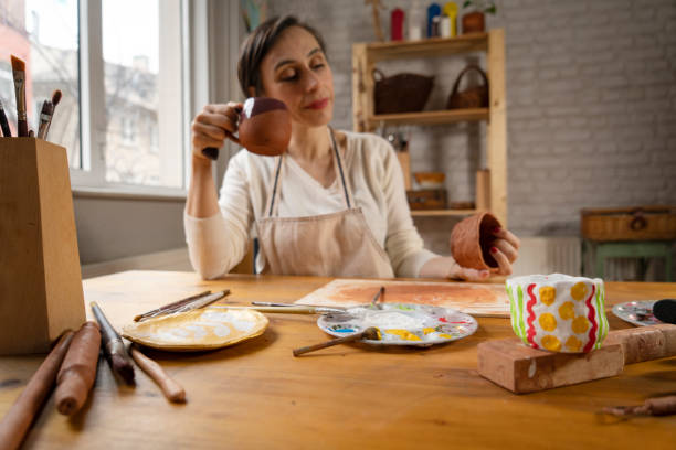 istock Ceramist artist female work in studio 1502419772
