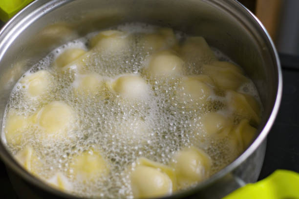 istock Dumplings with meat boiled in boiling water. 1502419807