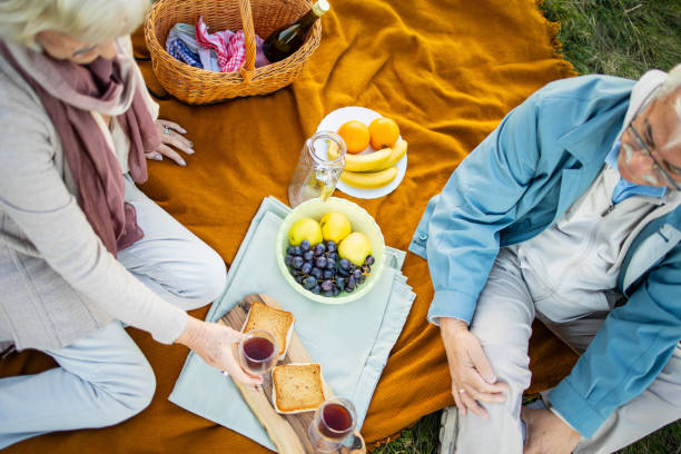 istock Senior couple having a picnic 1502421399